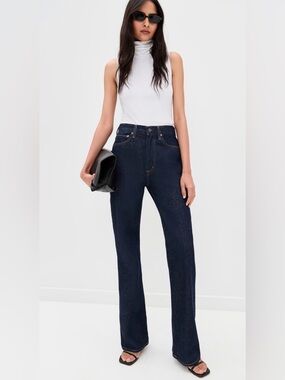 Agolde Leena mid rise baby flare jeans in the color rinse